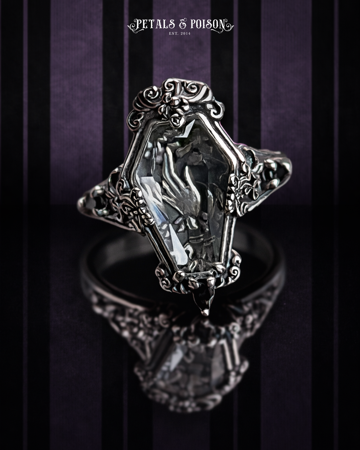 The "Mourning Hand" Glass Casket Ring
