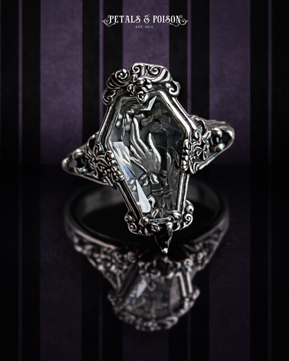The "Mourning Hand" Glass Casket Ring