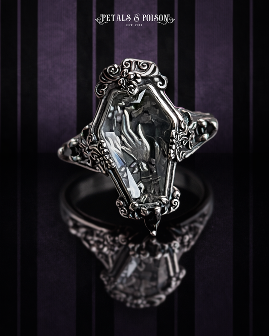 The "Mourning Hand" Glass Casket Ring