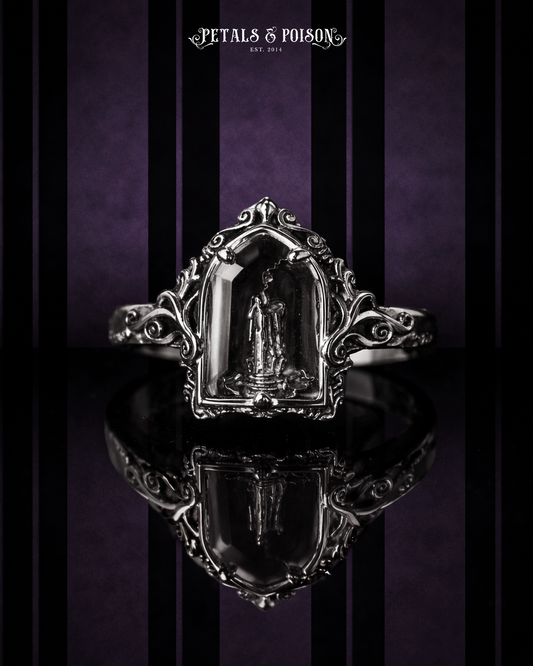 The "Mourning Candle” Glass Casket Ring