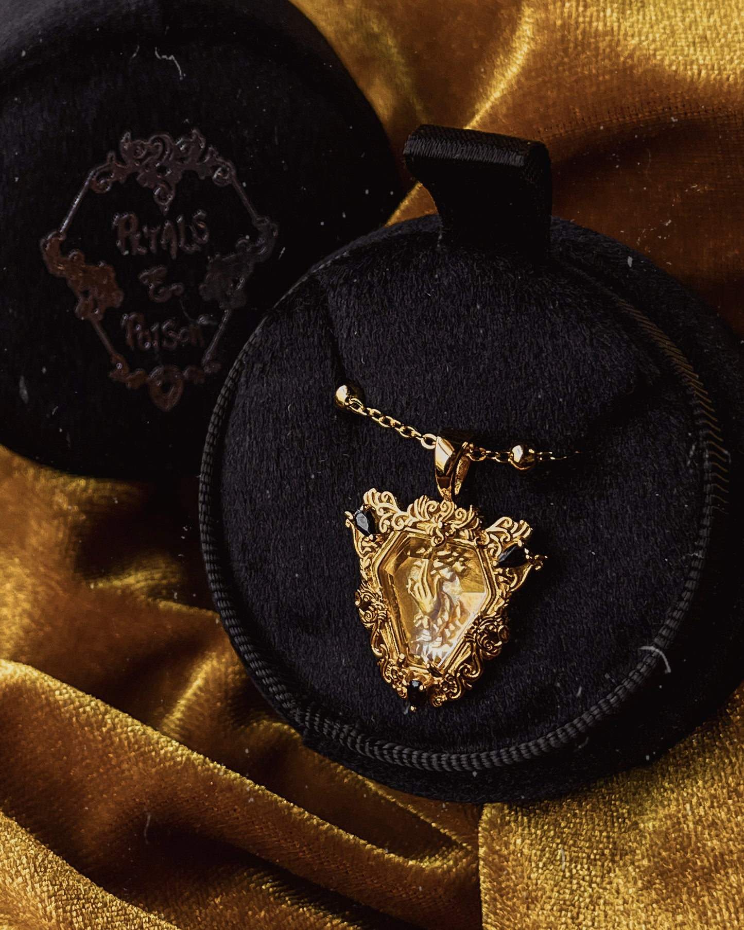 The GOLD Glass Casket "Mourning Hand" Necklace