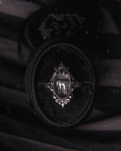 The "Black Ribbon Asylum” Glass Casket Ring