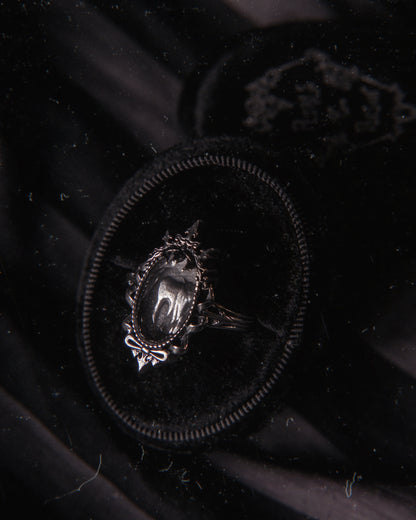 The "Black Ribbon Asylum” Glass Casket Ring